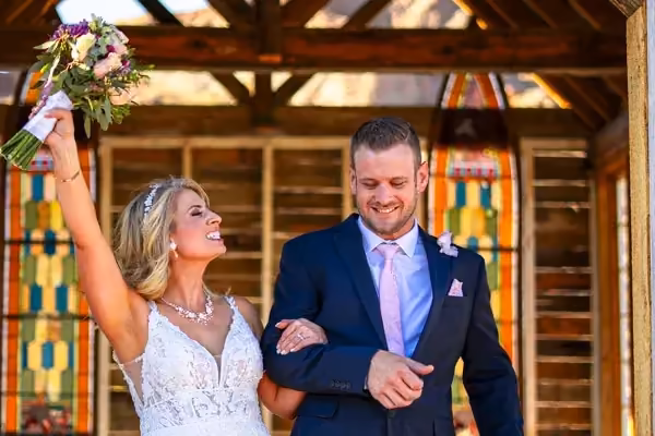 An eloping couple shares a private ceremony at Nelson Ghost Town, just the two of them under the open Nevada sky in Eldorado Canyon